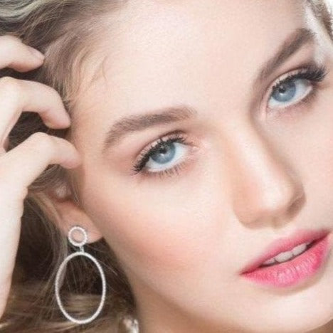 Rhodium Plated Sterling Silver Design Rounded Earrings with White Zirconias - Nelissima Jewelry